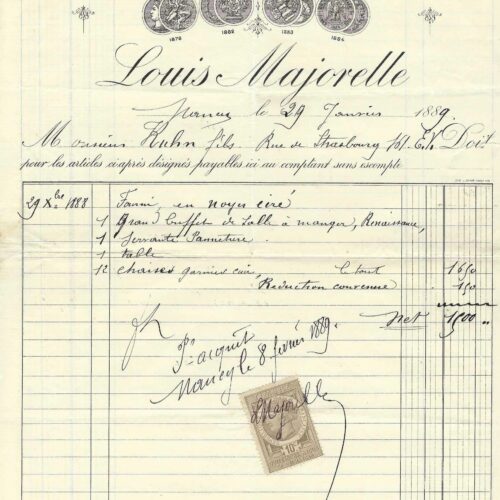 Louis Majorelle vend un ensemble de meubles de salon.