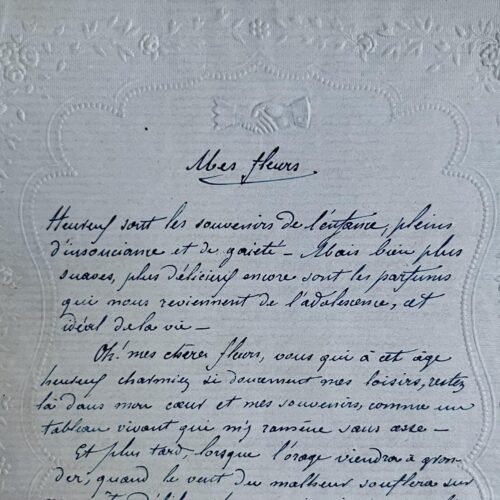 Charmant texte manuscrit "Mes fleurs", sur papier à lettre gaufré aux motifs floraux