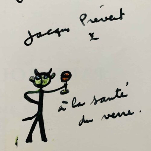 Jacques Prévert signs an exhibition booklet with a funny little drawing